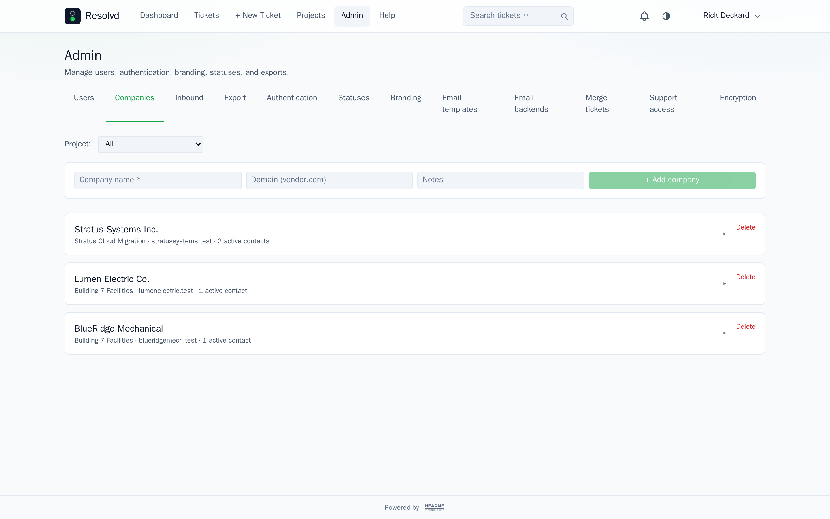 Admin → Companies, project-scoped vendor list — Stratus Systems Inc., Lumen Electric Co., BlueRidge Mechanical — each with domain, project, and active contact count.